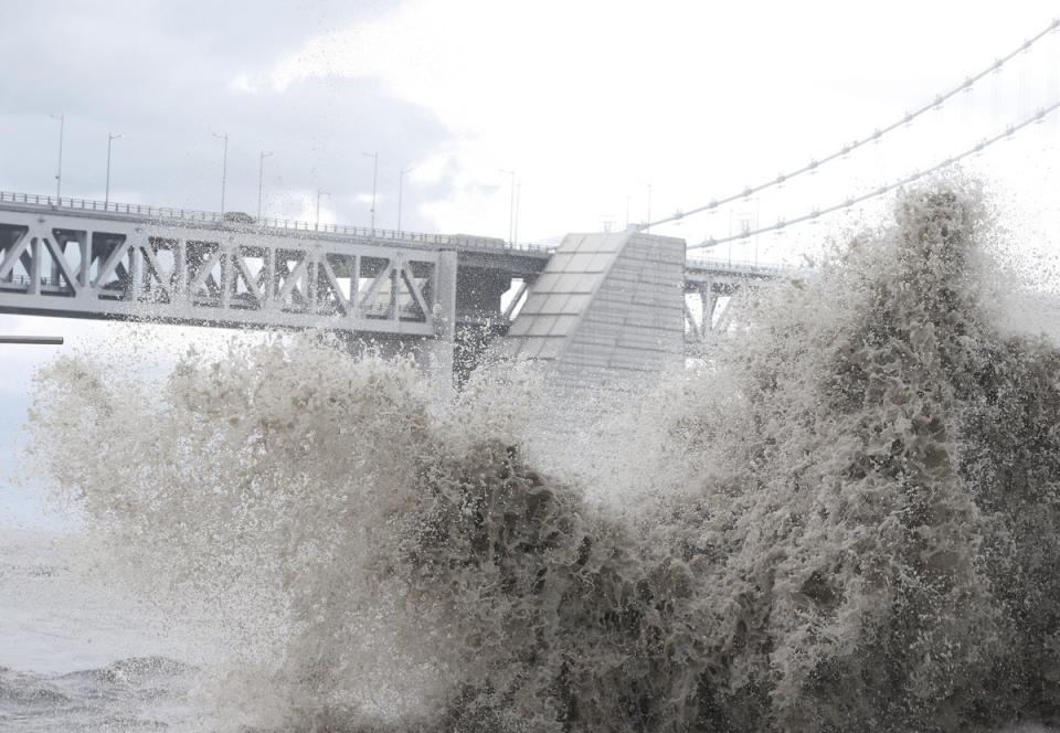 High waves pound the coast, caused by Typhoon Hinnamnor in Busan, South Korea (EPA)