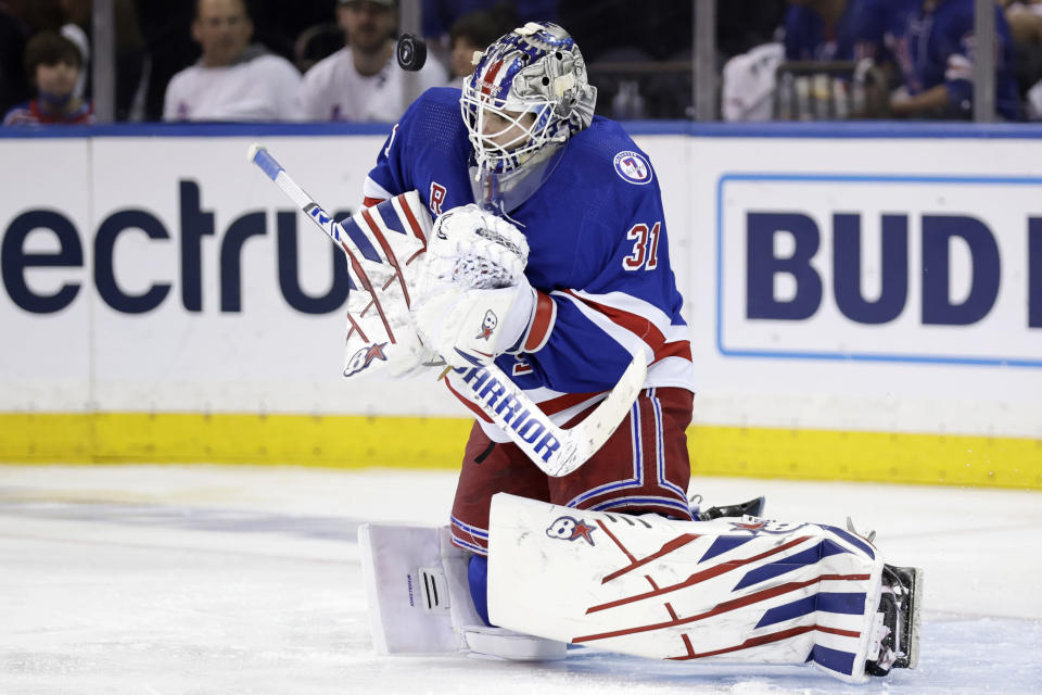 New York Rangers goaltender Igor Shesterkin makes a save against the Carolina Hurricanes during the second period of Game 3 of an NHL hockey Stanley Cup second-round playoff series, Sunday, May 22, 2022, in New York. (AP Photo/Adam Hunger)