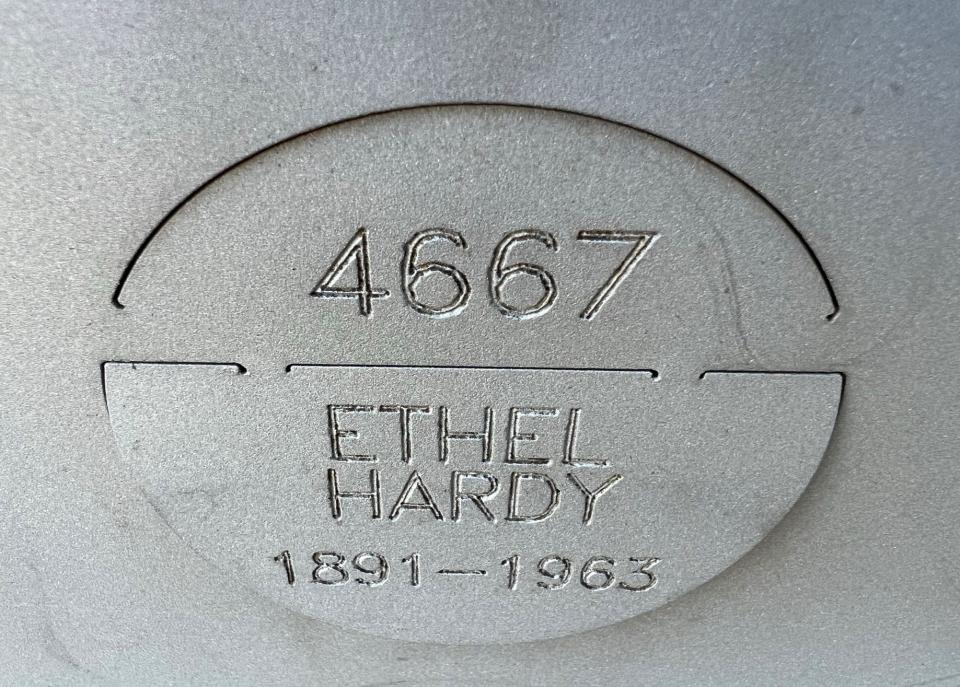 Each niche on the Oregon State Hospital Memorial wall has a circular plate engraved with a number, name and birthday and death years, if known. The empty holes signify cremains reunified with family members.