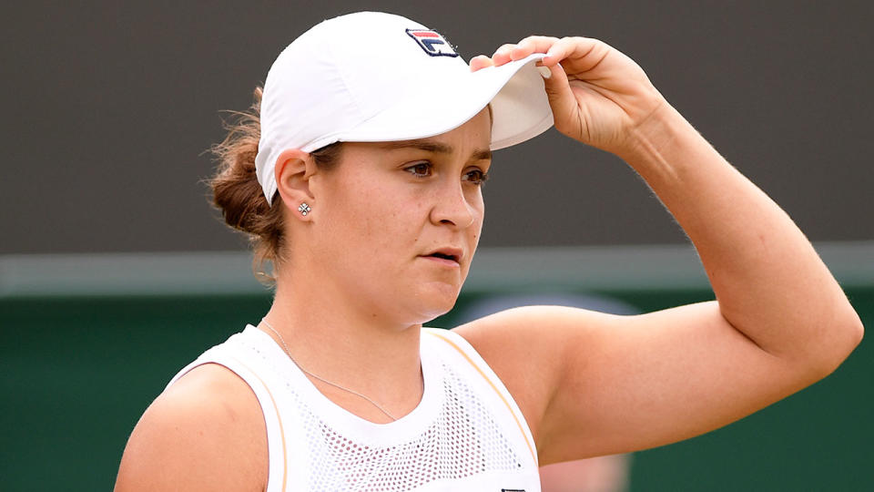 Pictured here, Ash Barty looks on during a match at Wimbledon.