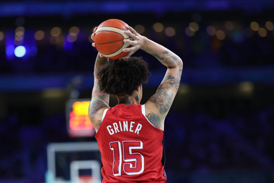 USA's No. 15 Brittney Griner passes the ball in the women's basketball preliminary round Group C match between Germany and the USA during the Paris 2024 Olympic Games at the Pierre Mauroy Stadium in Villeneuve-d'Ascq, northern France, on August 4, 2024. (Photo by Thomas COEX / AFP) (Photo by THOMAS COEX/AFP via Getty Images)