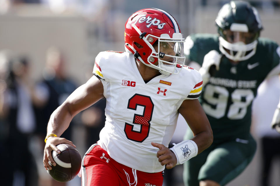 Maryland quarterback Taulia Tagovailoa scrambles against Michigan State during the first half of an NCAA college football game, Saturday, Sept. 23, 2023, in East Lansing, Mich. (AP Photo/Al Goldis)