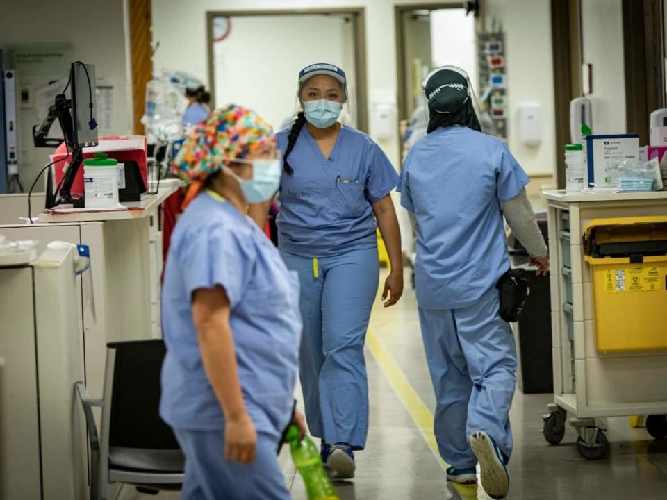 Nurses move through the halls of the emergency department at Scarborough General Hospital in Toronto. ER departments in northwestern Ontario remain in a critical staffing crunch, which shows no signs of easing.  (Evan Mitsui/CBC - image credit)