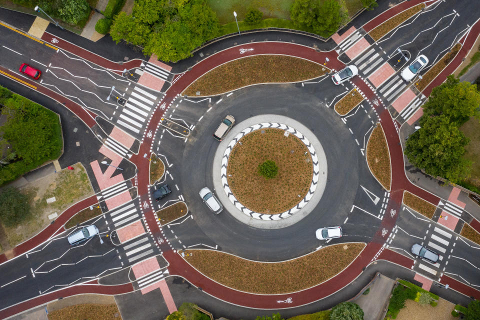The UK's first Dutch-style roundabout � which prioritises cyclists and pedestrians over motorists � has opened in Fendon Road, Cambridge. The cost of the scheme, originally estimated at around GBP 800,000, has almost trebled to GBP 2.3m at the end of the project.