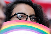 <p>Dafne Jacobs, a Deferred Action for Childhood Arrivals (DACA) program recipient stands with supporters during a rally outside the Federal Building in Los Angeles, Calif., Sept. 1, 2017. (Photo: Kyle Grillot/Reuters) </p>