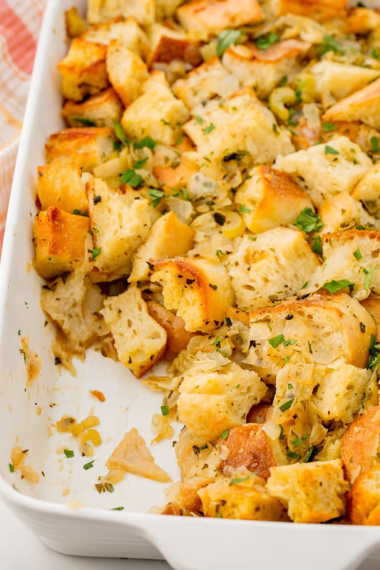 <p>At its simplest, stuffing is a seasoned bread cube mixture of onion and herbs. Traditionally, it's stuffed inside the bird, but we prefer to bake ours in a separate baking dish. </p><p>Get the <a href="https://www.delish.com/uk/cooking/recipes/a30376943/classic-homemade-turkey-stuffing-recipe/" rel="nofollow noopener" target="_blank" data-ylk="slk:Classic Stuffing;elm:context_link;itc:0;sec:content-canvas" class="link ">Classic Stuffing</a> recipe. </p>