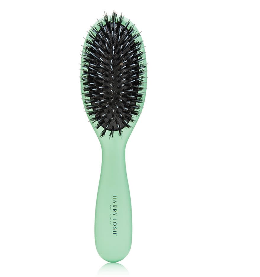 This Harry Josh Pro Tools Mini Oval Brush glides through hair, tangles and knots for a silky shine. Find it for $25 at <a href="https://fave.co/2WLvsHq" target="_blank" rel="noopener noreferrer">Dermstore</a>.