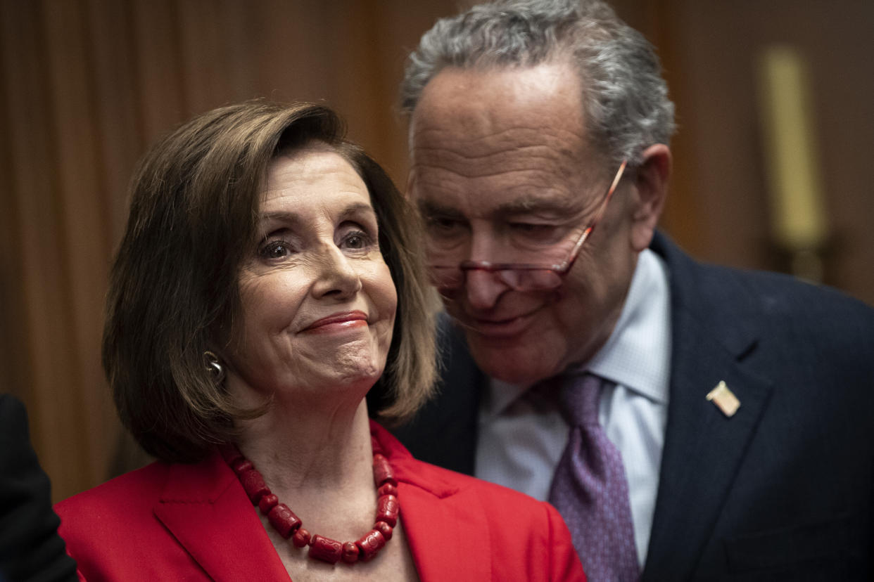 House Speaker Nancy Pelosi (D-Calif.) and Senate Minority Leader Chuck Schumer (D-N.Y.) speak with each other at a news conference with Deferred Action for Childhood Arrivals recipients to discuss the Supreme Court case concerning the program on Nov. 12, 2019, in Washington, D.C. (Photo: Drew Angerer via Getty Images)