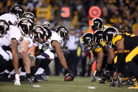 Dec 25, 2016; Pittsburgh, PA, USA; Baltimore Ravens center Jeremy Zuttah (53) prepares to snap the ball against the Pittsburgh Steelers defense during the second quarter at Heinz Field. Mandatory Credit: Charles LeClaire-USA TODAY Sports