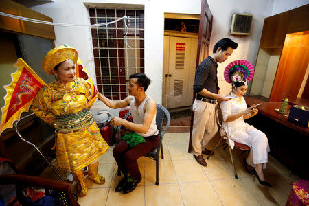 Vietnamese mediums get ready for a performance at a theatre in Hanoi, Vietnam, May 7, 2017. REUTERS/Kham