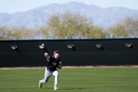 Chicago White Sox starting pitcher Mike Clevinger (52) works out during a spring training baseball practice, Wednesday, Feb. 15, 2023, in Phoenix. (AP Photo/Matt York)