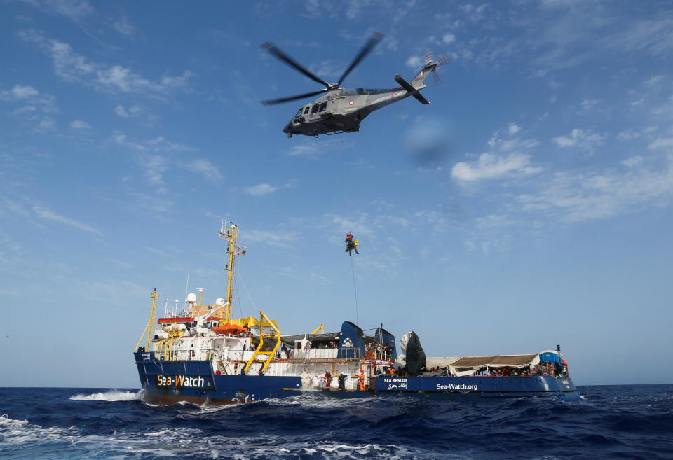 An Armed Forces of Malta helicopter medically evacuates a critically-ill Libyan boy and his family from the German NGO migrant rescue ship Sea-Watch 3 around 147 nautical miles south-west of Malta, in the western Mediterranean Sea, August 2, 2021. REUTERS/Darrin Zammit Lupi