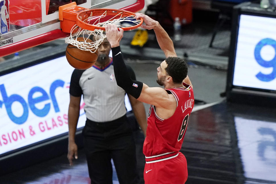 Chicago Bulls guard Zach LaVine dunks against the Detroit Pistons during the second half of an NBA basketball game in Chicago, Wednesday, Feb. 17, 2021. The Bulls won 105-102. (AP Photo/Nam Y. Huh)