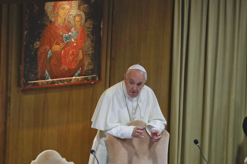 Pope Francis speaks during the opening session of the Amazon synod, at the Vatican, Monday, Oct. 7, 2019. Pope Francis opened a three-week meeting on preserving the rainforest and ministering to its native people as he fended off attacks from conservatives who are opposed to his ecological agenda. (AP Photo/Andrew Medichini)