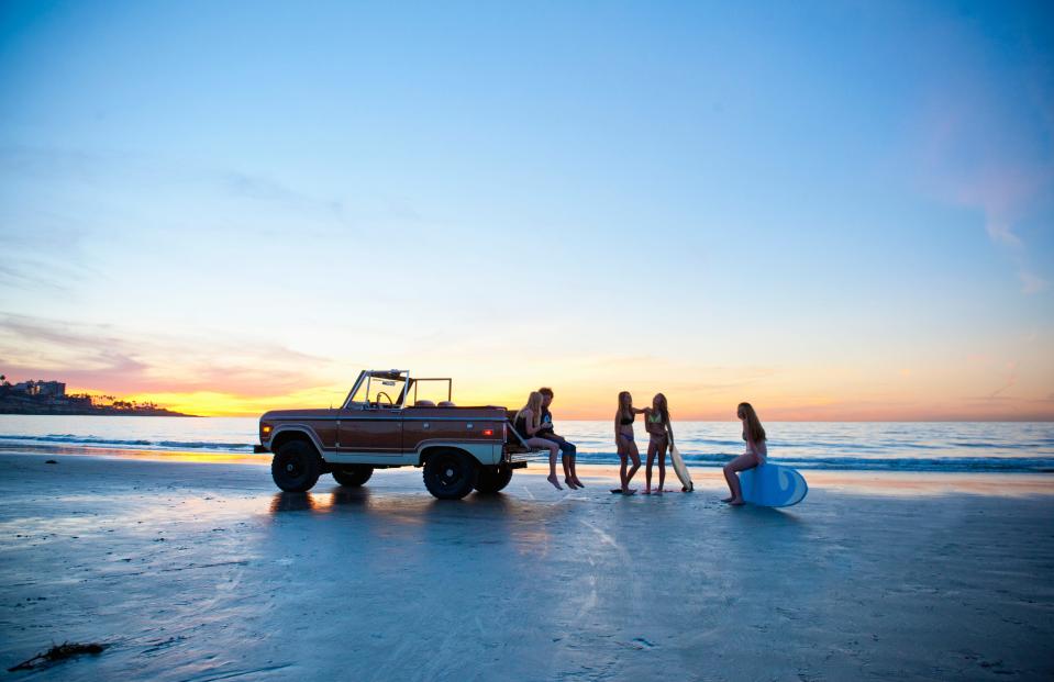 Friends hanging out at the beach.