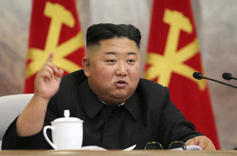 In this undated photo provided on Sunday, May 24, 2020, by the North Korean government, North Korean leader Kim Jong Un speaks during a meeting of the Seventh Central Military Commission of the Workers' Party of Korea in North Korea.