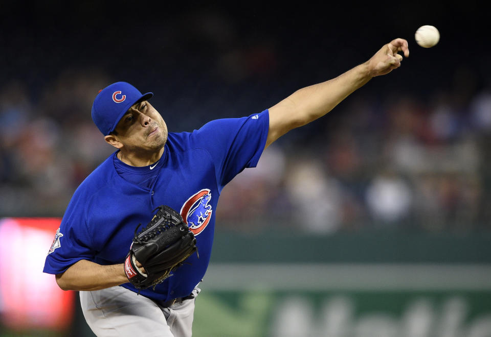 Chicago Cubs relief pitcher Jorge De La Rosa delivers during the fourth inning of the first baseball game of a doubleheader against the Washington Nationals, Saturday, Sept. 8, 2018, in Washington. (AP Photo/Nick Wass)