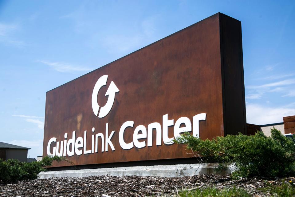 The sign at the GuideLink Center is seen, Thursday, April 28, 2022, in Iowa City, Iowa.