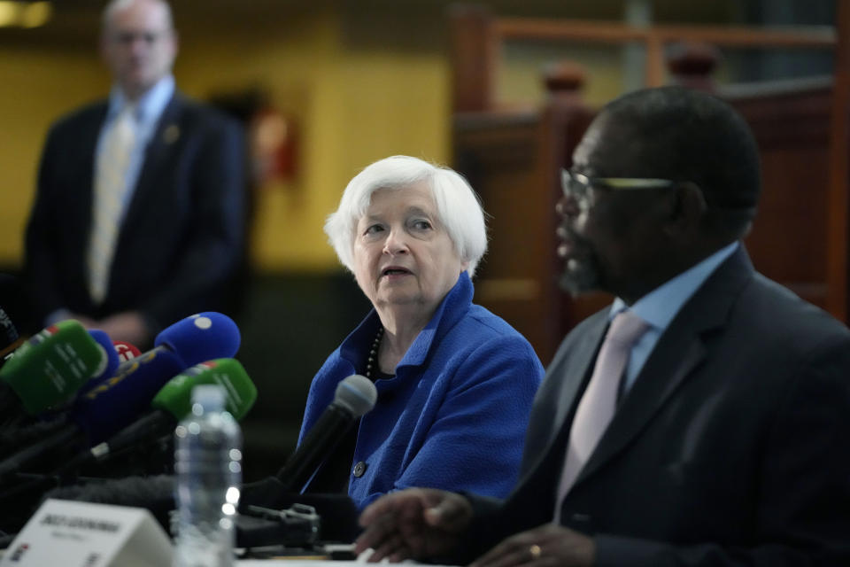 U.S. Treasury Secretary Janet Yellen, left, listens as South Africa's Minister of Finance Enoch Godongwana makes his opening remarks during their meeting at the National Treasury in Pretoria, South Africa, Thursday, Jan. 26, 2023, part of her South Africa visit. AYellen is on a 10-day tour of Africa, part of a push by the Biden administration to engage more with the world's second-largest continent. (AP Photo/Themba Hadebe)