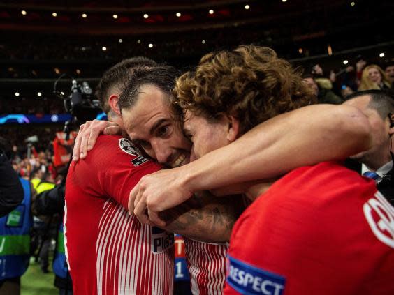 Atletico Madrid celebrate Diego Godin’s goal (EPA)