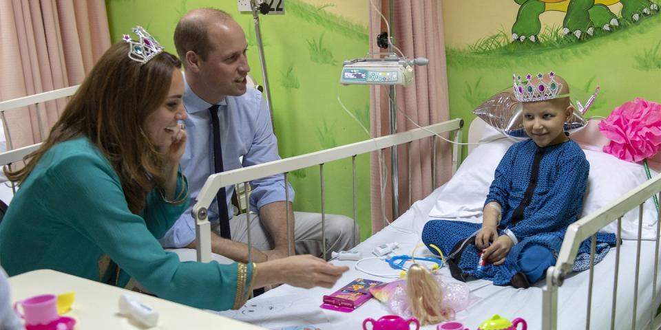 <p>The duchess dons a tiara for a tea party with a patient at the Shaukat Khanum Memorial Cancer Hospital.</p>
