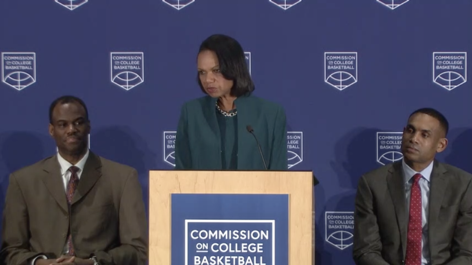 Commission on College Basketball chair Condoleezza Rice delivers recommendations on April 25, 2018, alongside Commission members David Robinson (L) and Grant Hill.