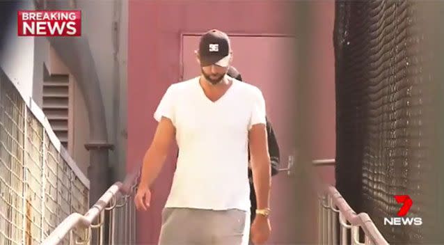 Grant Hackett leaving a Gold Coast police station earlier this year. Picture: 7 News