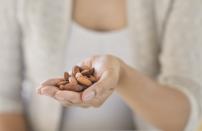 <p>Snacking on a handful of almonds will give you a dose of vitamin E, which can reduce your chances of catching a cold. </p>