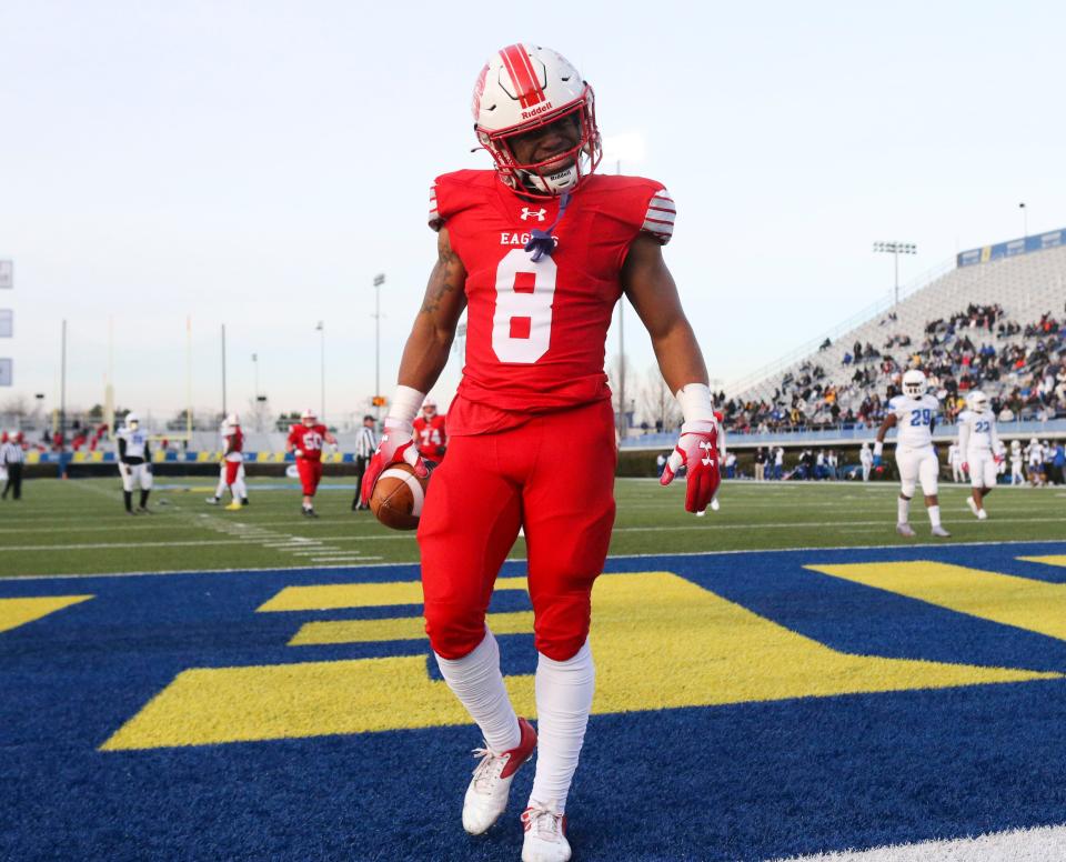 Smyrna's Yamir Knight enjoys a second quarter score in the DIAA Class 3A championship at Delaware Stadium, Saturday, Dec. 10, 2022.