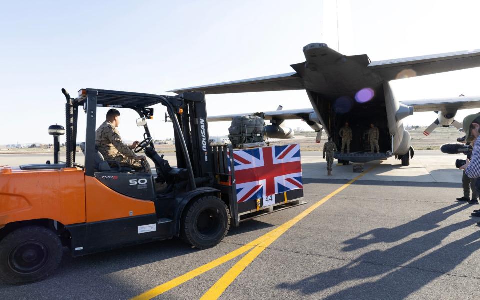 UK and Jordanian humanitarian aid for Gaza is loaded onto a Jordanian Air Force aircraft to be air-dropped into northern Gaza