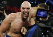 Tyson Fury, of England, celebrates after defeating Tom Schwarz, of Germany, in a heavyweight boxing match Saturday, June 15, 2019, in Las Vegas. (AP Photo/John Locher)