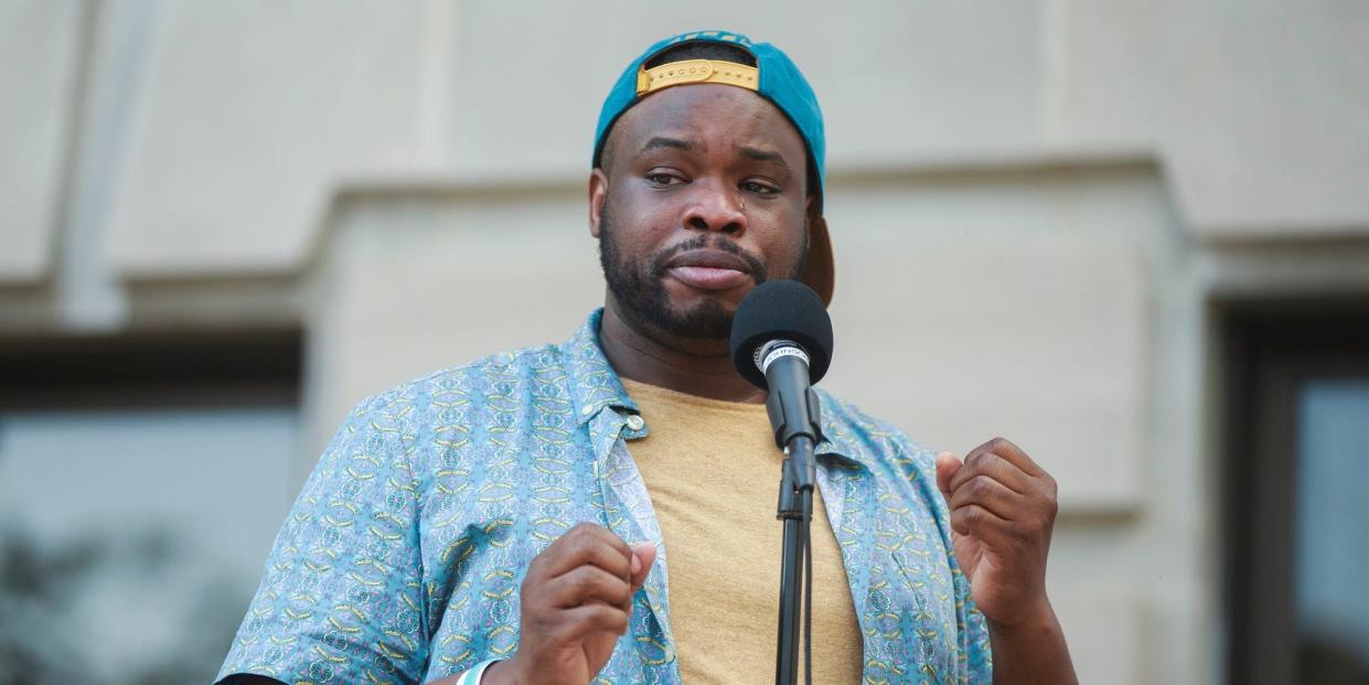 Vauhxx Booker speaks during a community gathering to fight against racism on July 6.