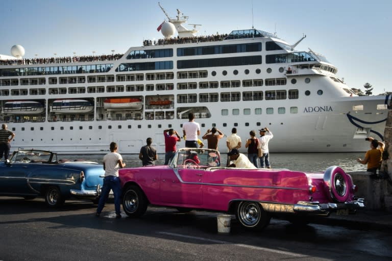 Cubans watch as the first US-to-Cuba cruise ship to arrive in the island nation in decades glides into the port of Havana, on May 2, 2016