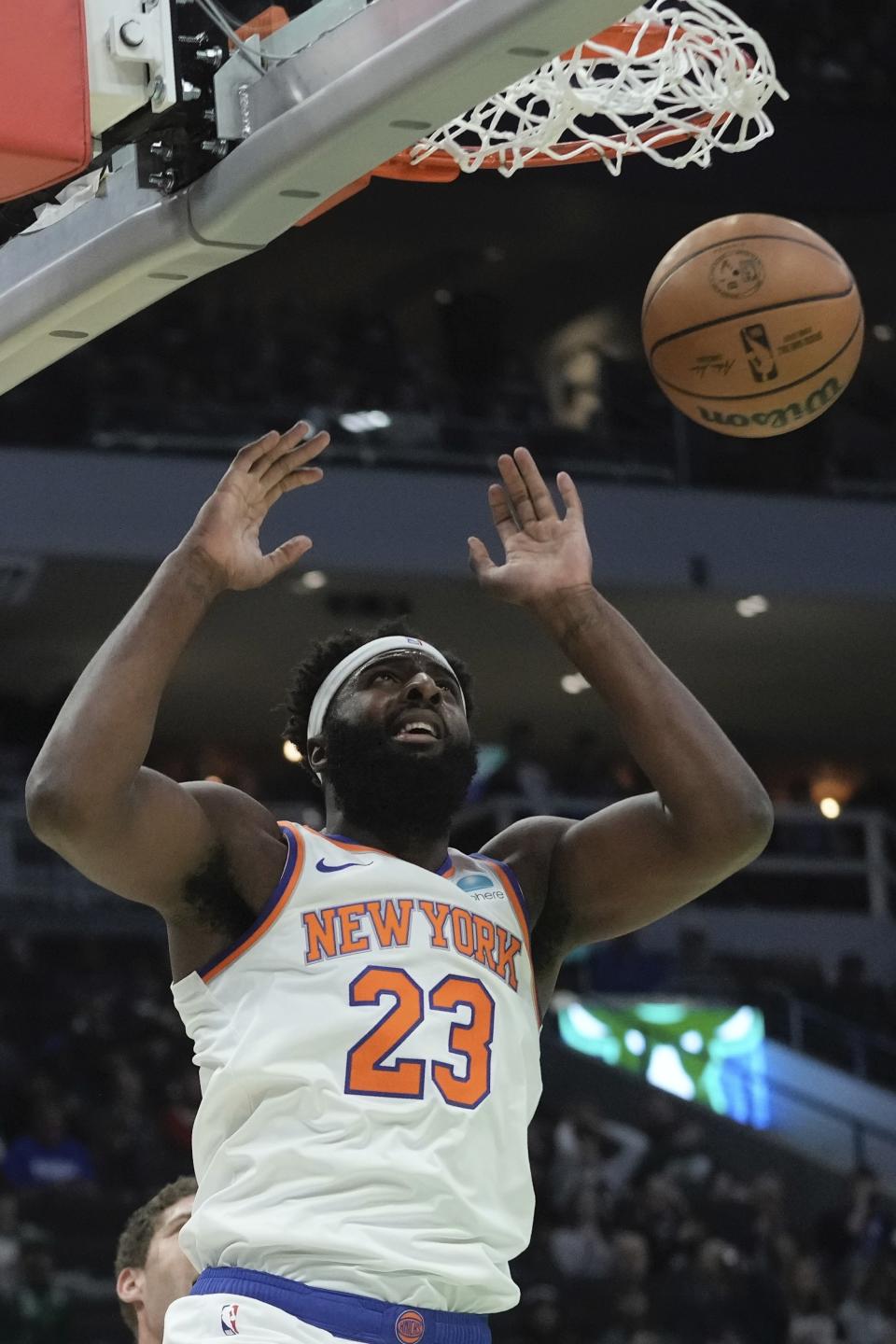 New York Knicks' Mitchell Robinson dunks during the first half of an NBA basketball game Tuesday, Dec. 5, 2023, in Milwaukee. (AP Photo/Morry Gash)