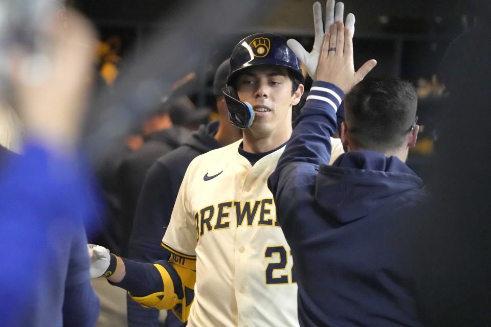Milwaukee Brewers outfielder Christian Yelich celebrates after hitting a home run during the sixth inning of a baseball game against the Seattle Mariners, Friday, April 5, 2024, in Milwaukee. (AP Photo/Kayla Wolf)