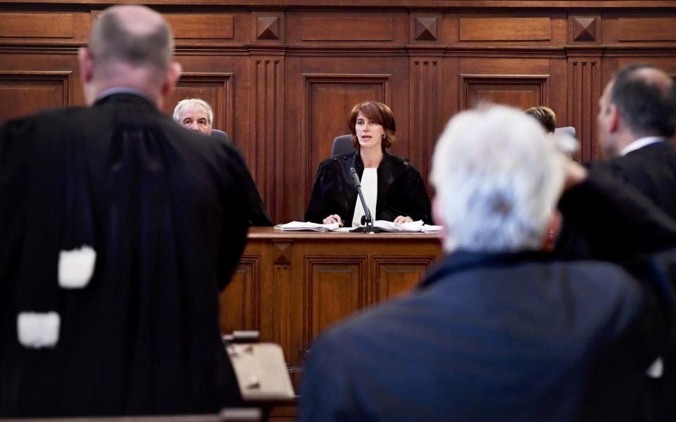 A judge speaks during the trial in front of the Brussels criminal court for human trafficking earlier this year - Credit: AFP