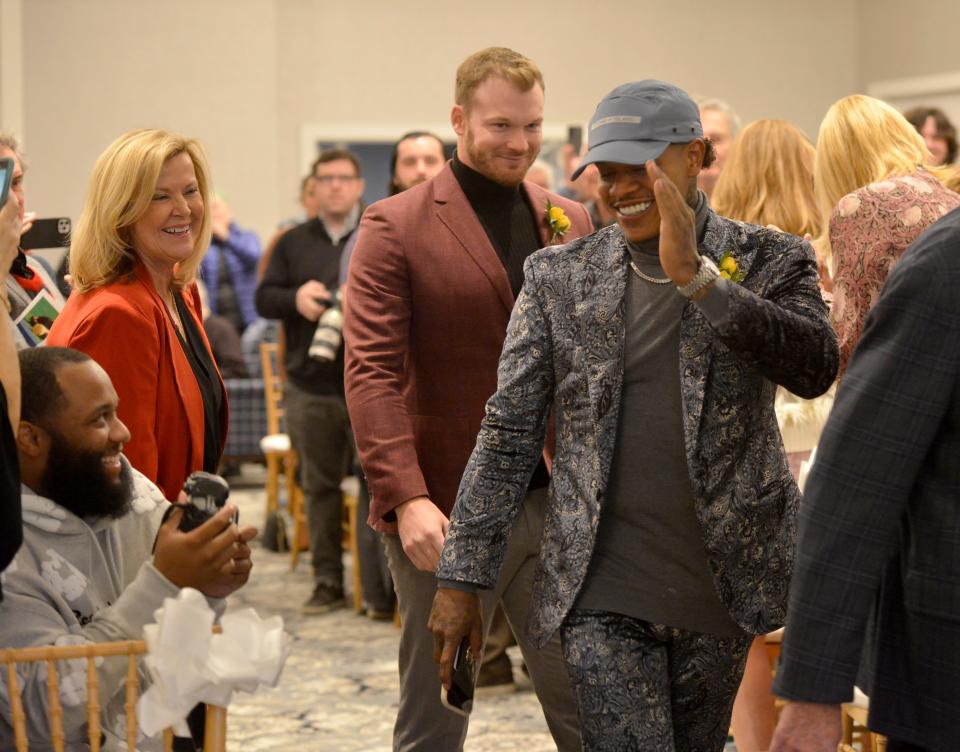 Former Cape Cod Baseball League player Marcus Stroman acknowledges his family as he walks in with his fellow hall of fame inductees at the start of Sunday's ceremony at Wequassett Resort and Golf Club in Harwich.