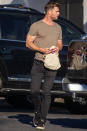 <p>Chris Hemsworth heads to a grocery store in Byron Bay, Australia, on Sunday.</p>