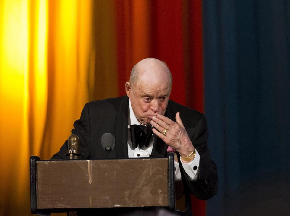 In this April 28, 2012 photo, comedic legend Don Rickles gestures onstage at The 2012 Comedy Awards in New York. The Comedy Awards will air on Sunday, May 6 at 9:00 p.m. EST on Comedy Central. (AP Photo/Charles Sykes)