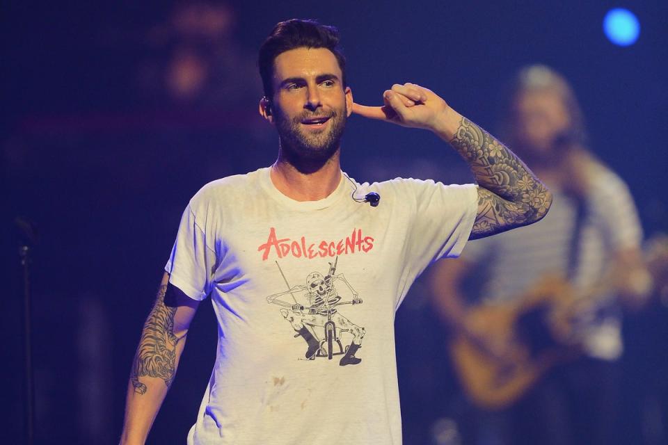 LAS VEGAS, NV - SEPTEMBER 21: Adam Levine of Maroon 5 performs onstage during the iHeartRadio Music Festival at the MGM Grand Garden Arena on September 21, 2013 in Las Vegas, Nevada.