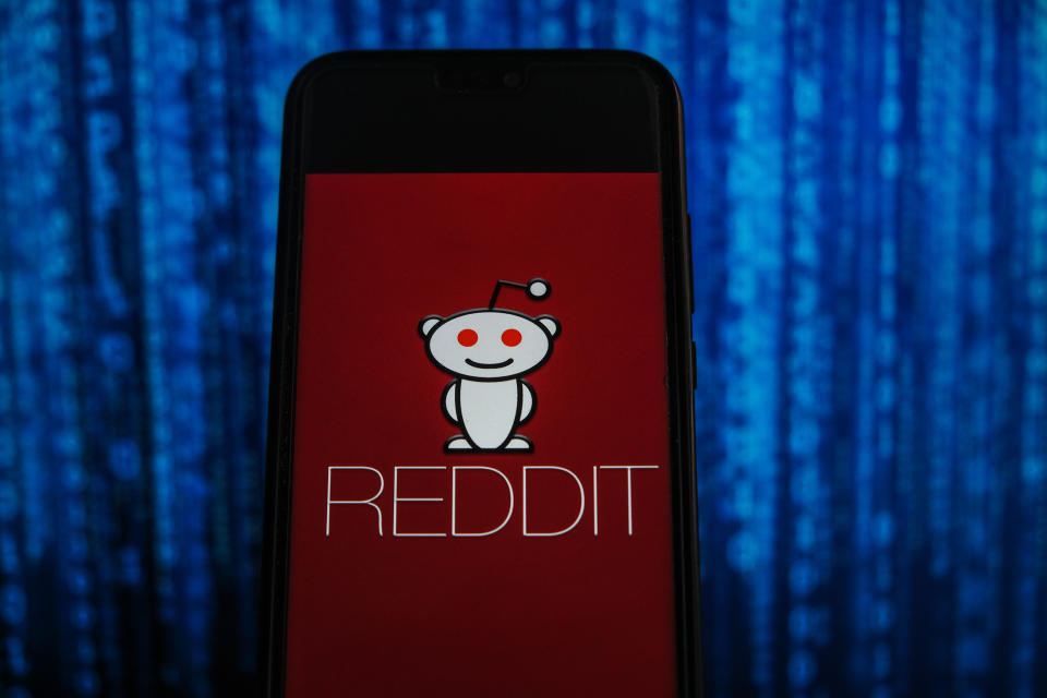 In this photo illustration a Reddit logo is displayed on a smartphone. Source: AAP