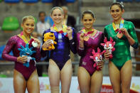 (L-R) Silver medal winner Shawn Johnson of the United States, gold medal winner Bridgette Carquatto of the United States and bronze medal winners Marisela Cantu and Elsa Garcia of Mexico pose after the Women's Artistic Gymnastics Finals in Uneven Bars during Day 13 of the XVI Pan American Games at the Revolution Sports Complex on October 27, 2011 in Guadalajara, Mexico. (Photo by Dennis Grombkowski/Getty Images)