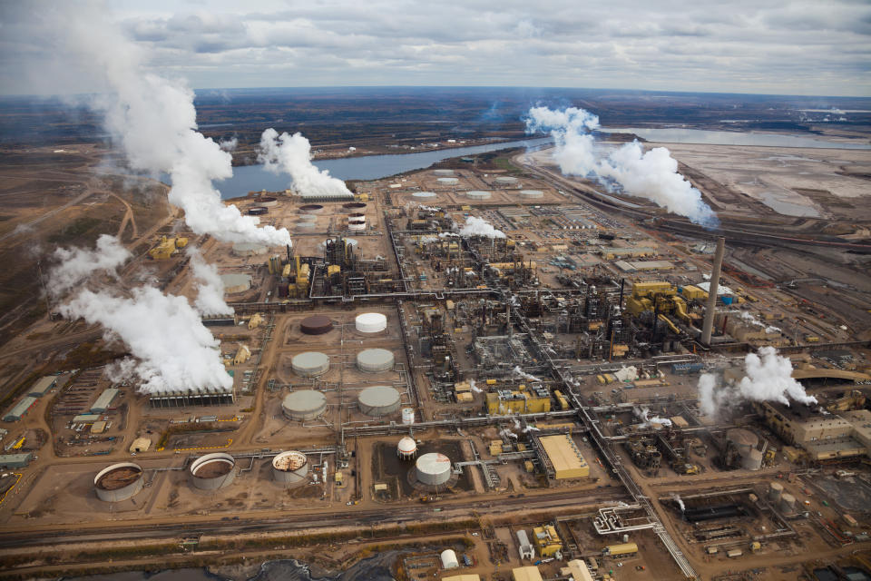 A large oil refinery along the Athabasca River in Alberta's Oilsands.  Fort McMurray, Alberta.