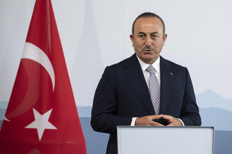 Mevluet Cavusoglu, Foreign Minister of Turkey, addresses the media during a joint press conference with Swiss Federal Councilor Ignazio Cassis as part of an official visit in Bern, Switzerland, Friday, Aug. 14, 2020. (Peter Schneider/Keystone via AP)