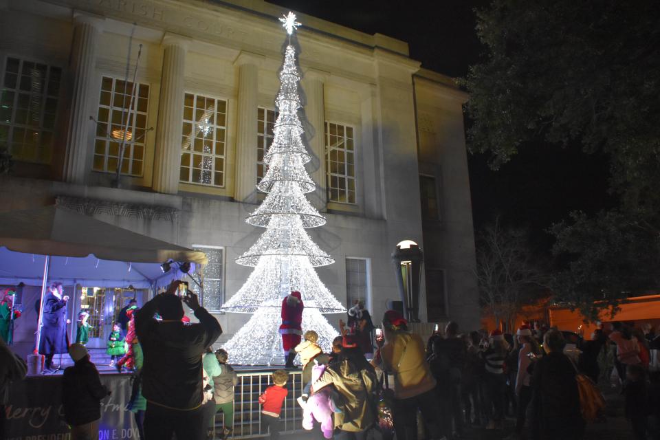 Santa Claus will light the Christmas tree on the Houma Courthouse Steps after the Houma Christmas Parade on Saturday.