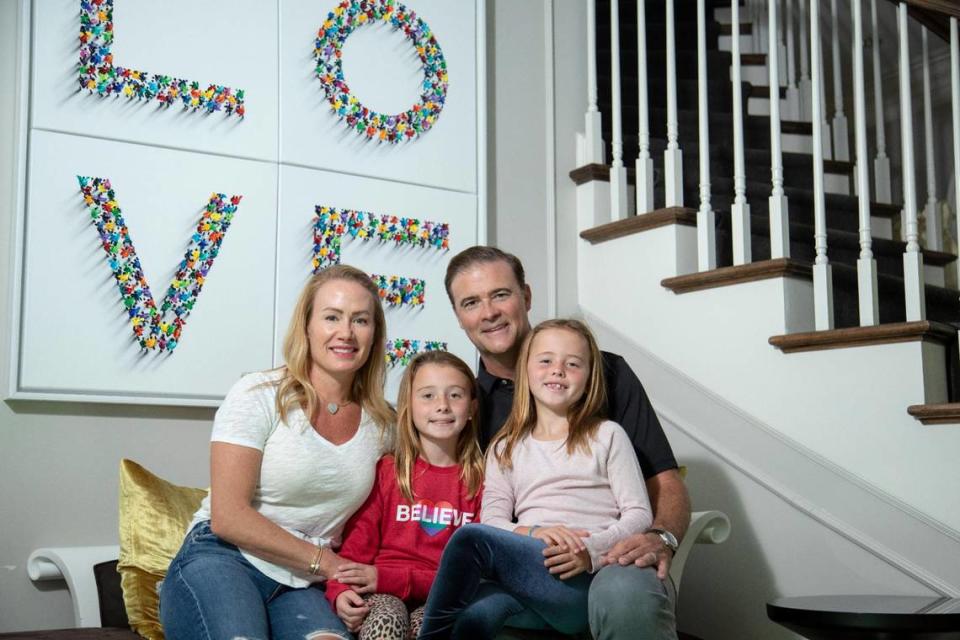 Former Kentucky women’s basketball head coach Matthew Mitchell at home this week with his wife, Jenna, and two daughters, Presley and Saylor. Mitchell, 50, says working at home during the coronavirus pandemic caused a family-oriented change in his priorities which led to his surprise resignation as UK head coach before the 2020-21 season.