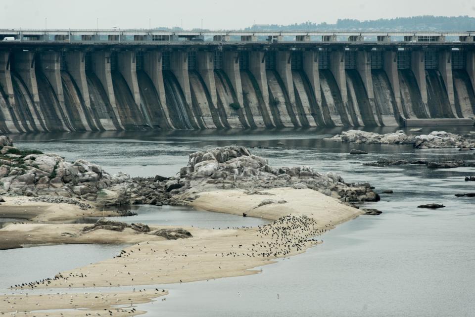 The Dnipro hydroelectric power plant after the Dnipro River's water level dropped following the Kakhovka dam breach, on July 9, 2023. (Elena Tita/Global Images Ukraine via Getty Images)