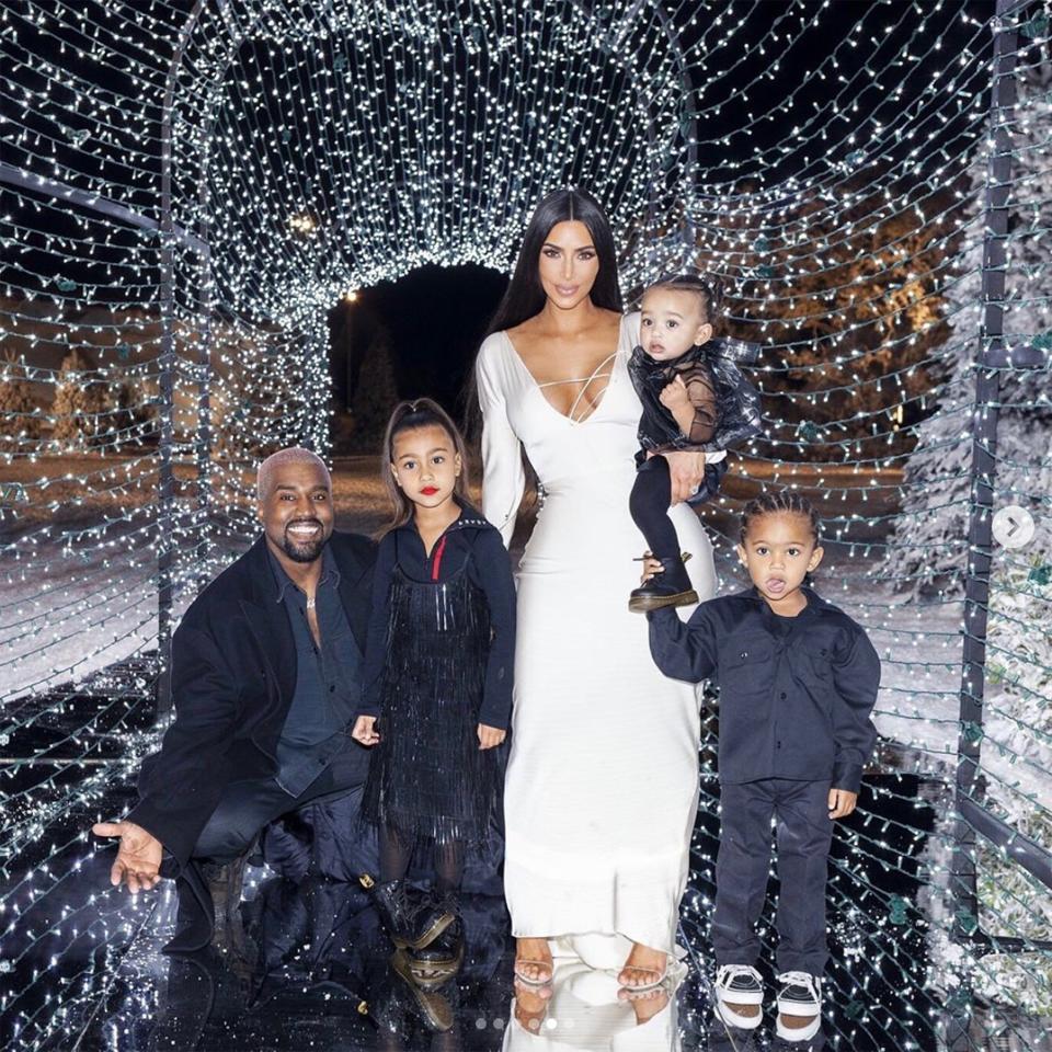At the party, Kanye and Kim, who are currently expecting their fourth child, posed with their children — daughters North, 5½, and Chicago, 1, and son Saint, 3 — in front of a <a href="https://people.com/home/kim-kardashian-kanye-west-christmas-eve-party-cost-breakdown/" rel="nofollow noopener" target="_blank" data-ylk="slk:tunnel of 10,000 lights;elm:context_link;itc:0;sec:content-canvas" class="link ">tunnel of 10,000 lights</a> installed outside for the occasion. 