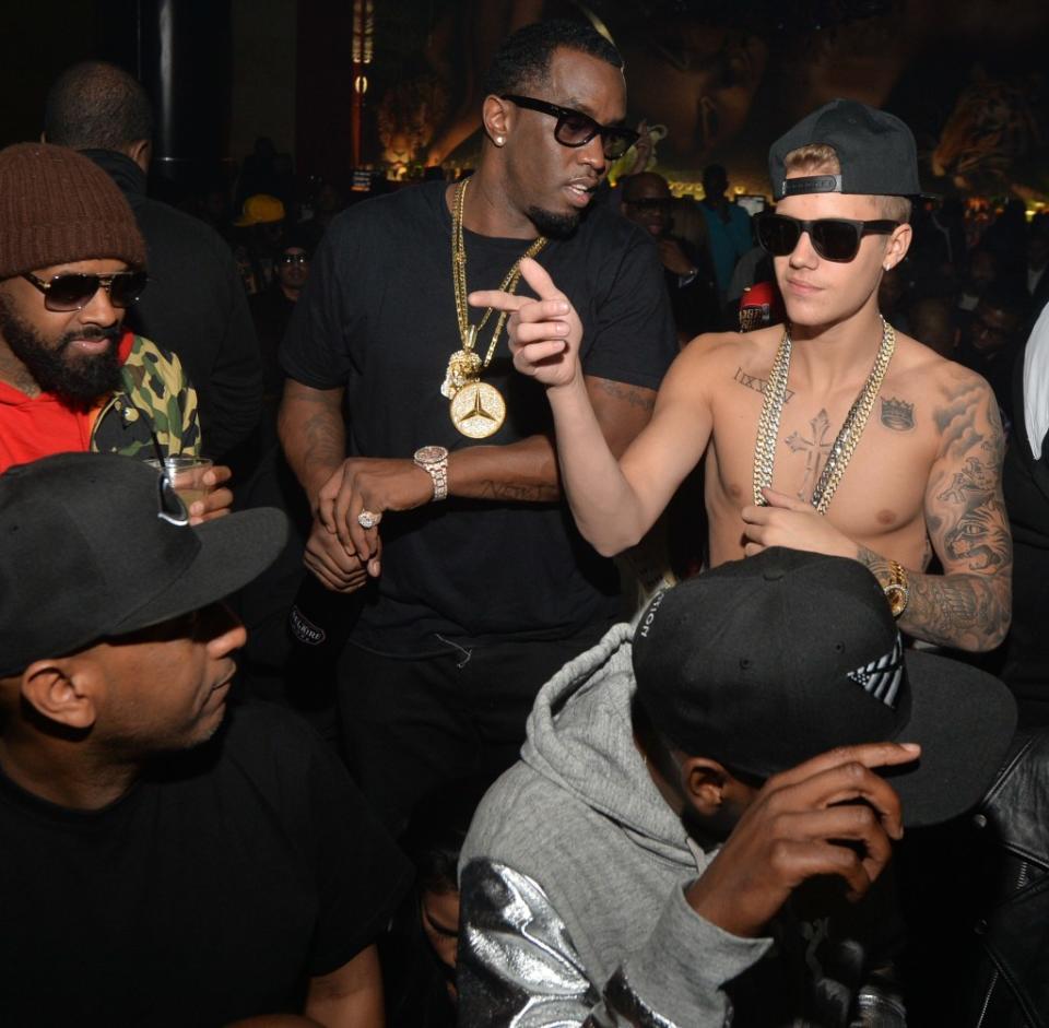 Diddy and a shirtless Justin Bieber at a party for Diddy’s Ciroc vodka in 2014. FilmMagic