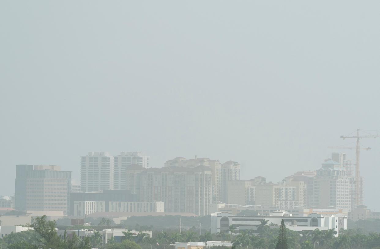 Smoke from Canadian wildfires creates a hazy city skyline in West Palm Beach, Florida, on Oct. 3, 2023.